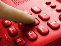 finger dailing red telephone